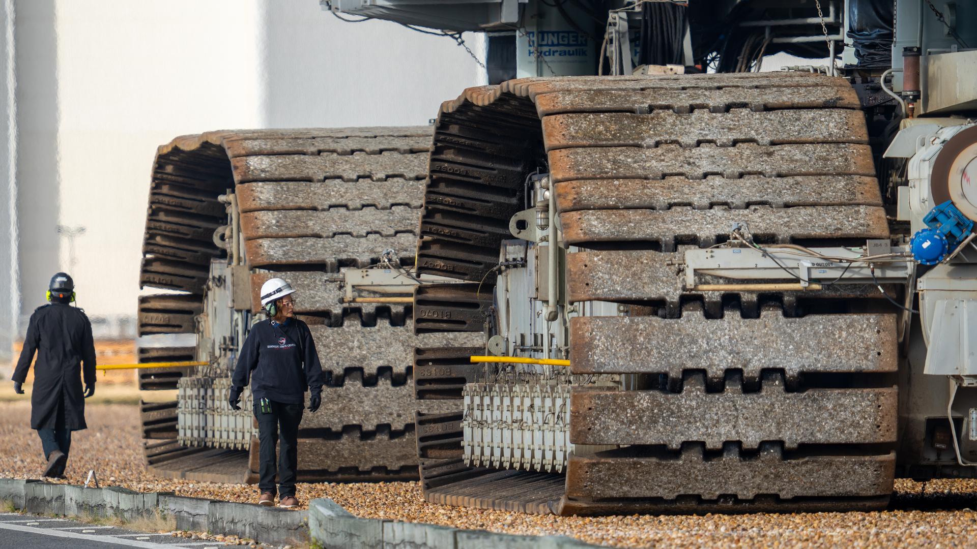 This image shows NASA’s SLS (Space Launch System) and Orion spacecraft rolling out of the Vehicle Assembly Building at NASA’s Kennedy Space Center. NASA's massive Crawler-Transporter, upgraded for the Artemis program, carries the powerful SLS rocket and Orion spacecraft on the Mobile Launcher from the Vehicle Assembly Building to Launch Pad 39B at Kennedy Space Center in preparation for the Artemis II mission. 